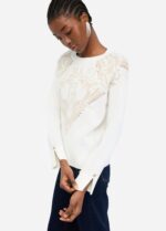 Maglia in lana jacquard con borchie e strass 7